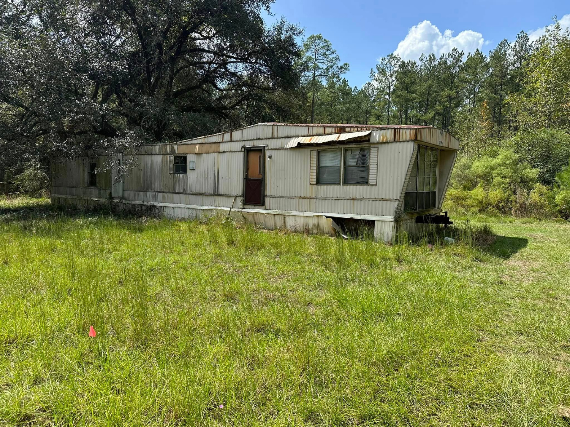 Abandoned mobile home before demolition